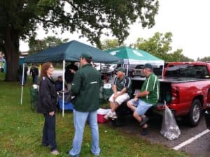 A few canopy tents, a portable grill, and friends make the perfect tailgate.