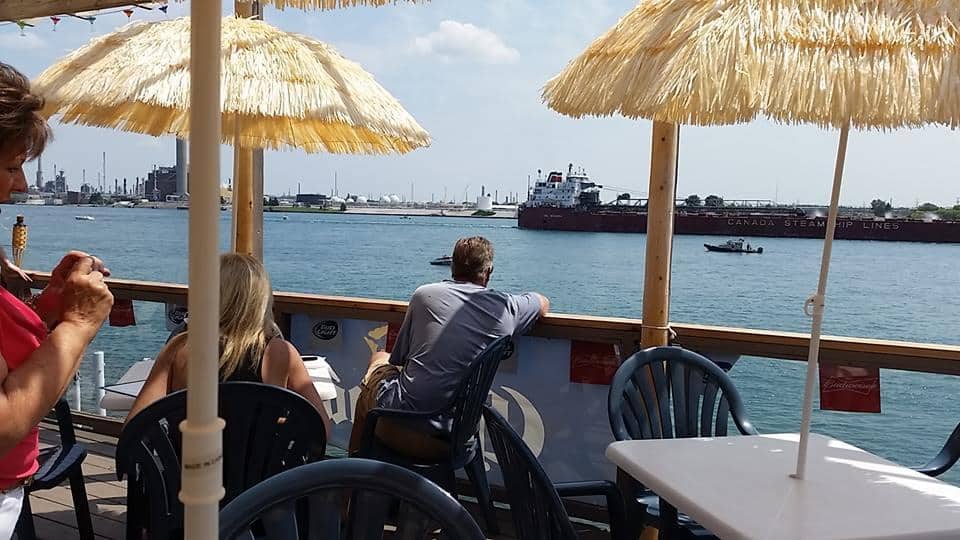 Watch Everything From Jet Skis To Freighters Passing By On The Beautiful St. Clair River From The Patio At Rix's On The Rocks In Port Huron. Photo Courtesy Of Merchant Circle