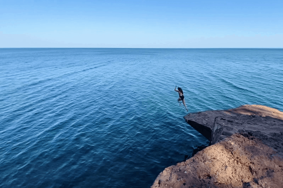 Cliff Jumping On Madeline Island In The Apostle Islands National Lakeshore - Cliff Jump At Black Rocks Marquette