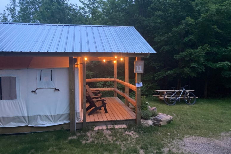 A Cabin Lit With Lights.