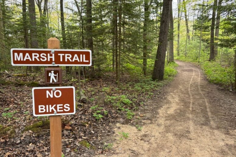 A Sign For The Marsh Trail Says &Quot;No Bikes&Quot; At Proud Lake State Recreation Area
